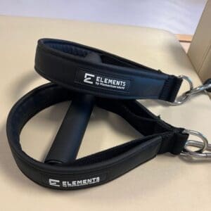 ELEMENTS® Compact Loop and Roll in black colour on a Pilates Reformer